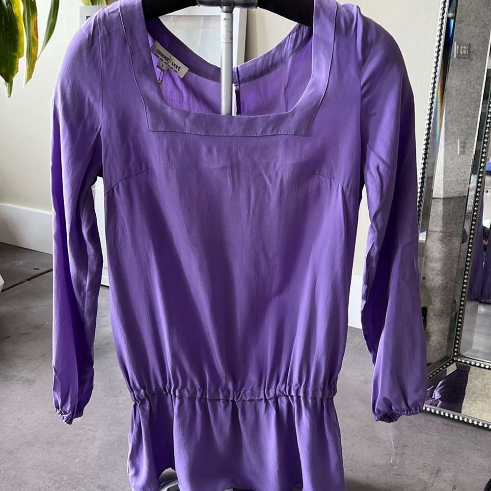 Beautiful billowy top, leave tucked in or out.